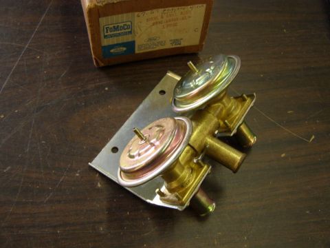 1967 Mercury Cougar - A 1967 FoMoCo heater control valve assembly is shown with its original box.