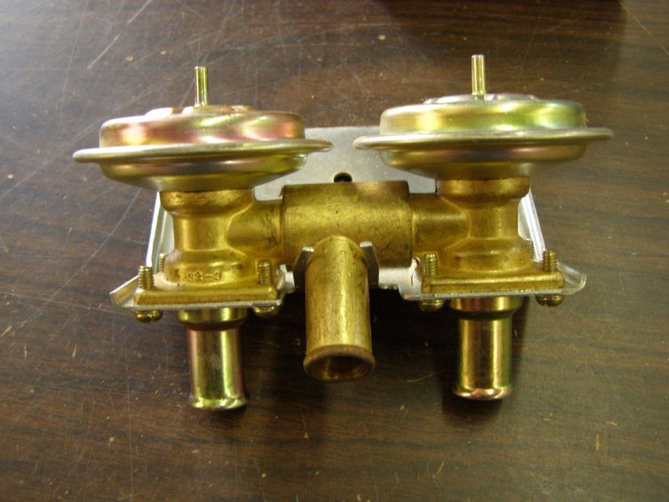 Brass heater control valve with two diaphragm actuators and hose fittings