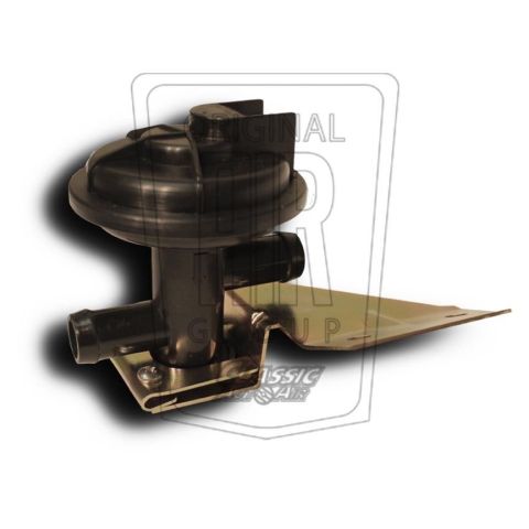 1967 Mercury Cougar - This black vacuum actuator with a metal mounting bracket is a vehicle part. No year or vehicle is visible in the image.