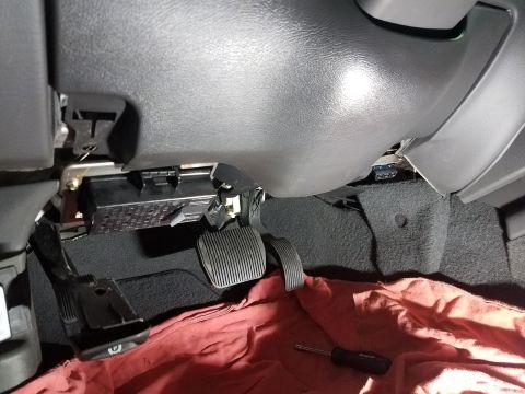 2003 Mercury Marauder - Interior view of the under-dash area with pedals and wiring visible.
