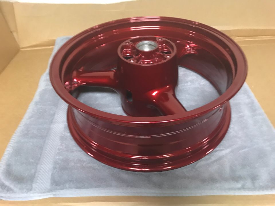 1998 ZX9R wheel lollypop red over super chrome base powder coat, new rotors, new bearings, new seals
