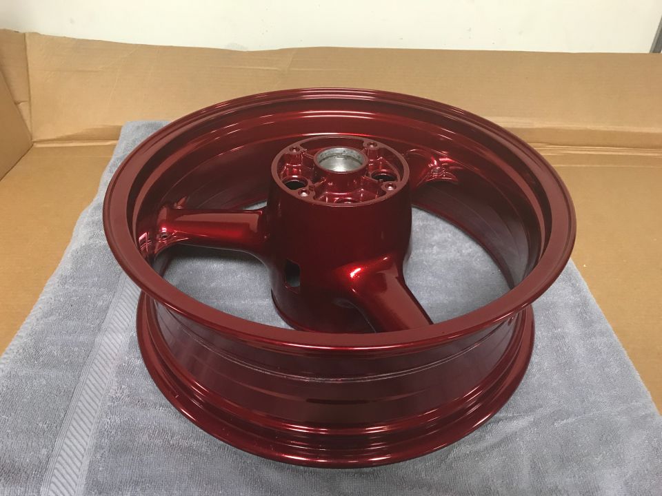 1998 ZX9R wheel lollypop red over super chrome base powder coat, new rotors, new bearings, new seals
