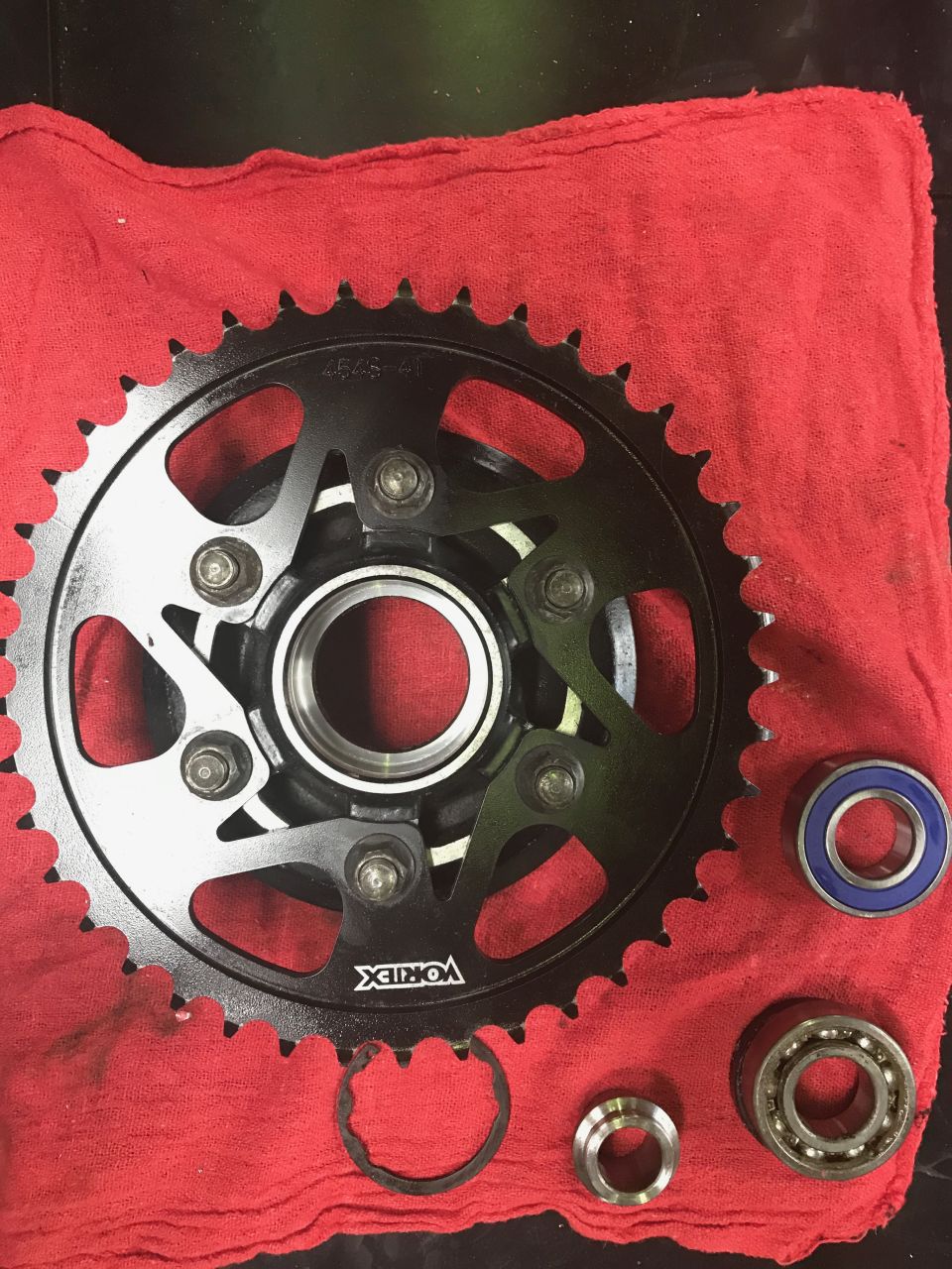 1998 ZX9R wheel lollypop red over super chrome base powder coat, new rotors, new bearings, new seals