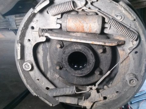 1996 Ford Bronco - This is a close-up view of the internal components of a drum brake assembly, likely from a 1996 Ford Bronco. The image shows the brake shoe…