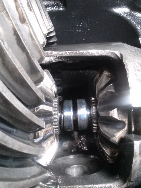 1996 Ford Bronco - Close-up view of the internal gears of a differential. The image shows meshing gears, likely from a 1996 Ford Bronco, with visible lubricat…