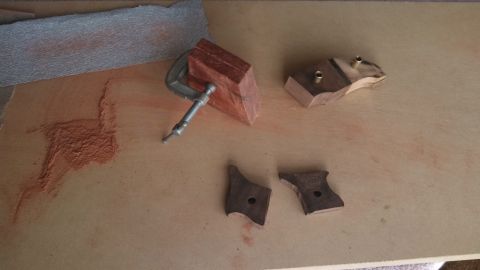 1974 Ford Ranchero - A wooden block is clamped to a surface, with two small wooden grip pieces and another wooden piece with brass inserts scattered around. The…