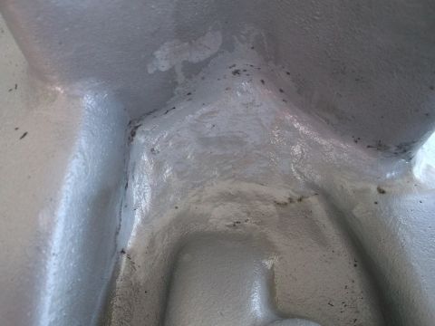 1963 Ford Galaxie - This image shows a close-up view of a gray engine block casting, with visible discoloration and some texture variations.