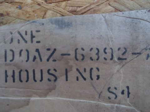 1963 Ford Galaxie - Stenciled text on a cardboard box reads 'ONE DOAZ-6392- HOUSING S4'.