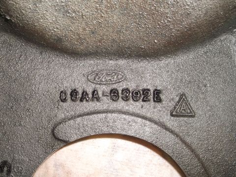 1963 Ford Galaxie - A cast iron part displays the Ford logo and the casting number C9AA-6392E, indicating a 1963 model year part.