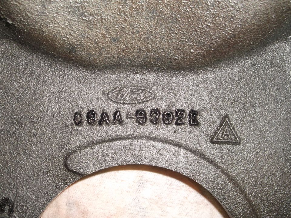 Cast iron part with Ford logo and casting number C9AA-6392E