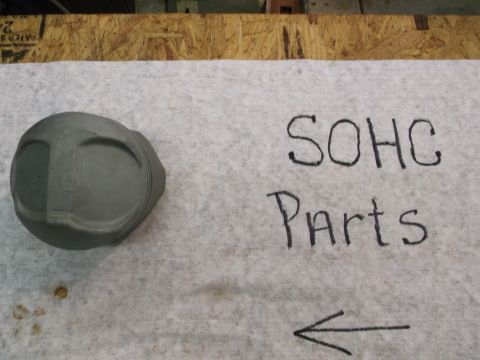 1963 Ford Galaxie - A piston is shown next to handwritten text indicating SOHC parts.