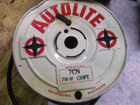 1963 Ford Galaxie - An Autolite wire spool made in Dearborn, Michigan, with a 7CN 7M-M 100FT label.