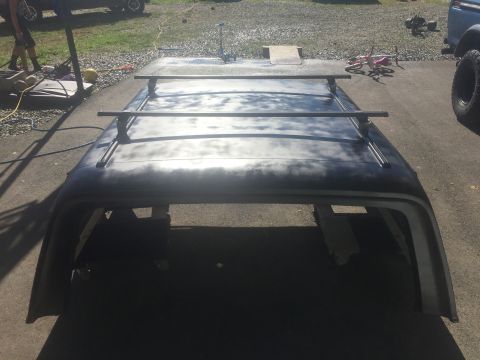 1979 Ford Bronco - Roof rack assembly is shown outdoors, possibly before installation or repair.