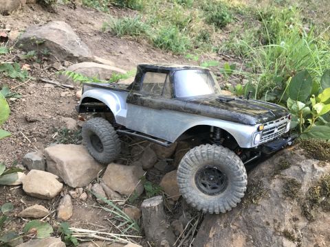 1989 Ford Bronco - This remote-controlled truck is designed for off-road adventures, tackling challenging rocky paths.