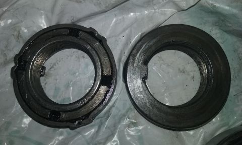 1995 Ford Bronco - Two metal bearing lock nuts are shown, one with a visible part number.