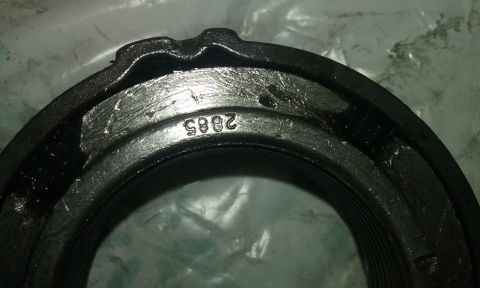 1995 Ford Bronco - A close-up view of a metal component with stamped identification numbers.