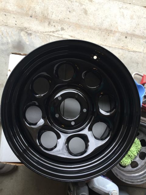 1975 Chevrolet Chevelle - A single black steel wheel is shown, with a second wheel partially visible to the right.