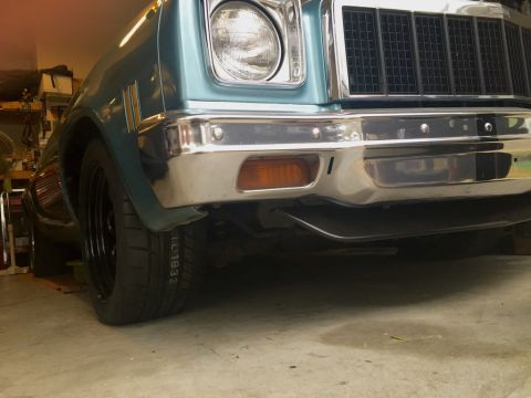 1975 Chevrolet Chevelle - The front of a vintage car is shown, a chrome bumper and a distinctive grille, with a watermark at the bottom right.