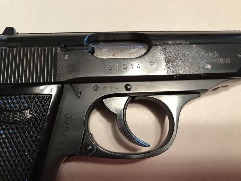 1989 Ford Bronco - Close-up of a Walther PPK pistol showing serial numbers and manufacturer markings.