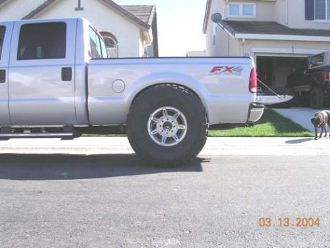 1994 Ford Bronco - this is to give an idea of how big these things really are. this is a totally stock F250 on 265's, and the 40 takes up the entire wheel wel…