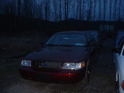 1999 Ford Crown Victoria - Close up shot of one of the red PIs.
