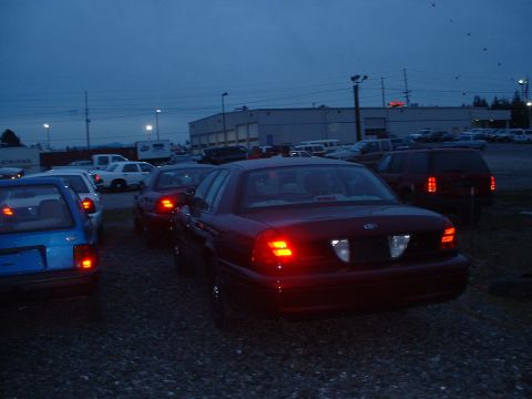 1999 Ford Crown Victoria - Rear View of the red PI.