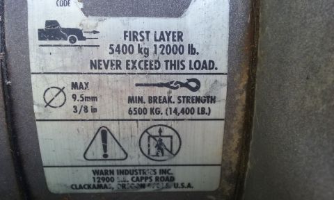 1995 Ford Bronco - Label details maximum load capacity and minimum break strength for winch cable.