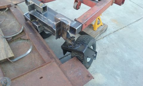 1995 Ford Bronco - Custom trailer frame fabrication in progress, supported by an engine hoist.