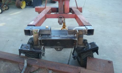 1995 Ford Bronco - A close-up view of a custom-fabricated trailer hitch assembly, showing its construction and components.