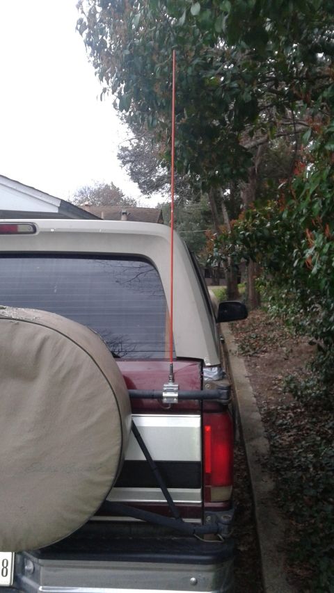 1996 Ford Bronco - Rear view of a 1996 Ford Bronco, showing the spare tire carrier and antenna mount.