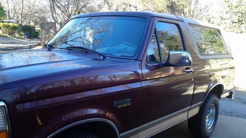 1996 Ford Bronco - This is a 1996 Ford Bronco, seen from the front quarter angle.