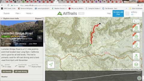 1995 Ford Bronco - A web browser displays a trail map for Lumsden Bridge Road, with route information and topographical details.