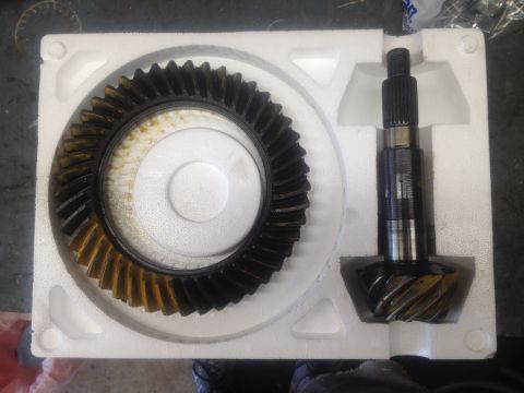 1979 Ford Bronco - A set of ring and pinion gears are shown, ready for installation into a vehicle's drivetrain.