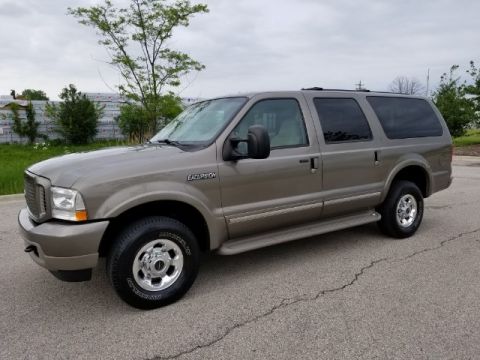 2003 Ford Excursion - This Ford Excursion SUV is shown from the front three-quarter angle on a cloudy day.