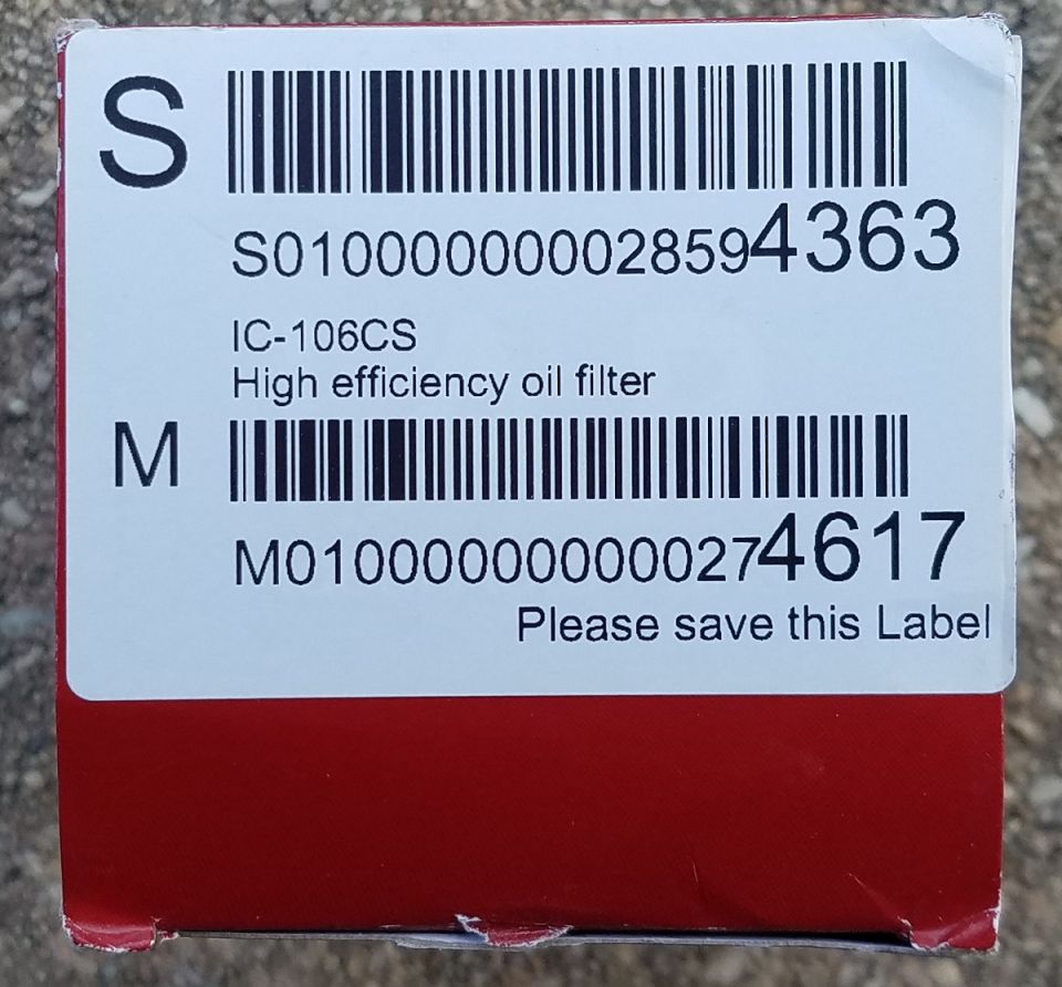 Label on a red box with product information and barcodes.
