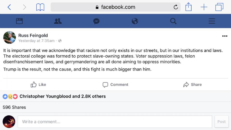 Screenshot of a Facebook post discussing racism in institutions and laws.