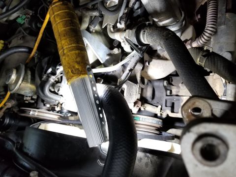 1988 Toyota Land Cruiser - This was the big problem: the alternator pivot bolt was barely hand-tight. So it wasn't clamped onto the engine bracket, and wasn't making…