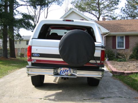 1993 Ford Bronco - This 1993 Ford Bronco is parked in a driveway in front of a brick house.
