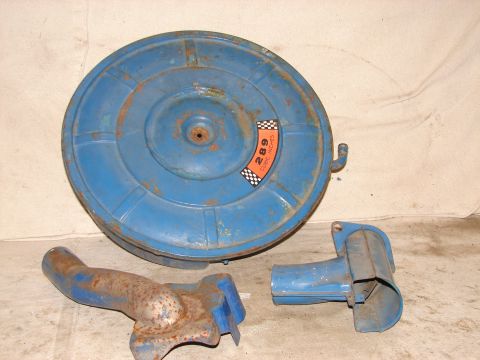 1973 Ford Ranchero - A blue air cleaner assembly and two intake tubes are shown, with a sticker indicating 289 cubic inches.