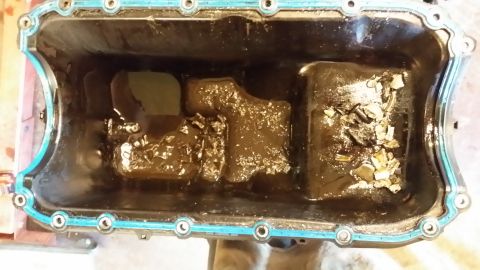 2003 Ford Ranger - Carnage found in the pan. Much of that is a piston skirt.