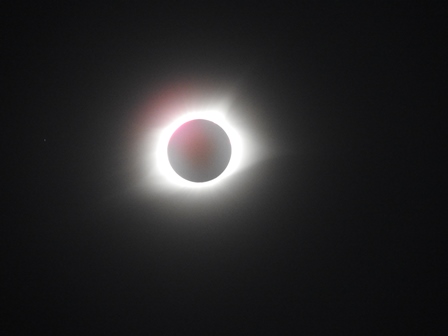 2007 Dodge Durango - A total solar eclipse is captured in this image, which also features the Supermotors.net logo in the lower right corner.