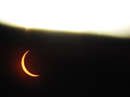 2007 Dodge Durango - A partial solar eclipse is captured in this image, showing the sun's corona.