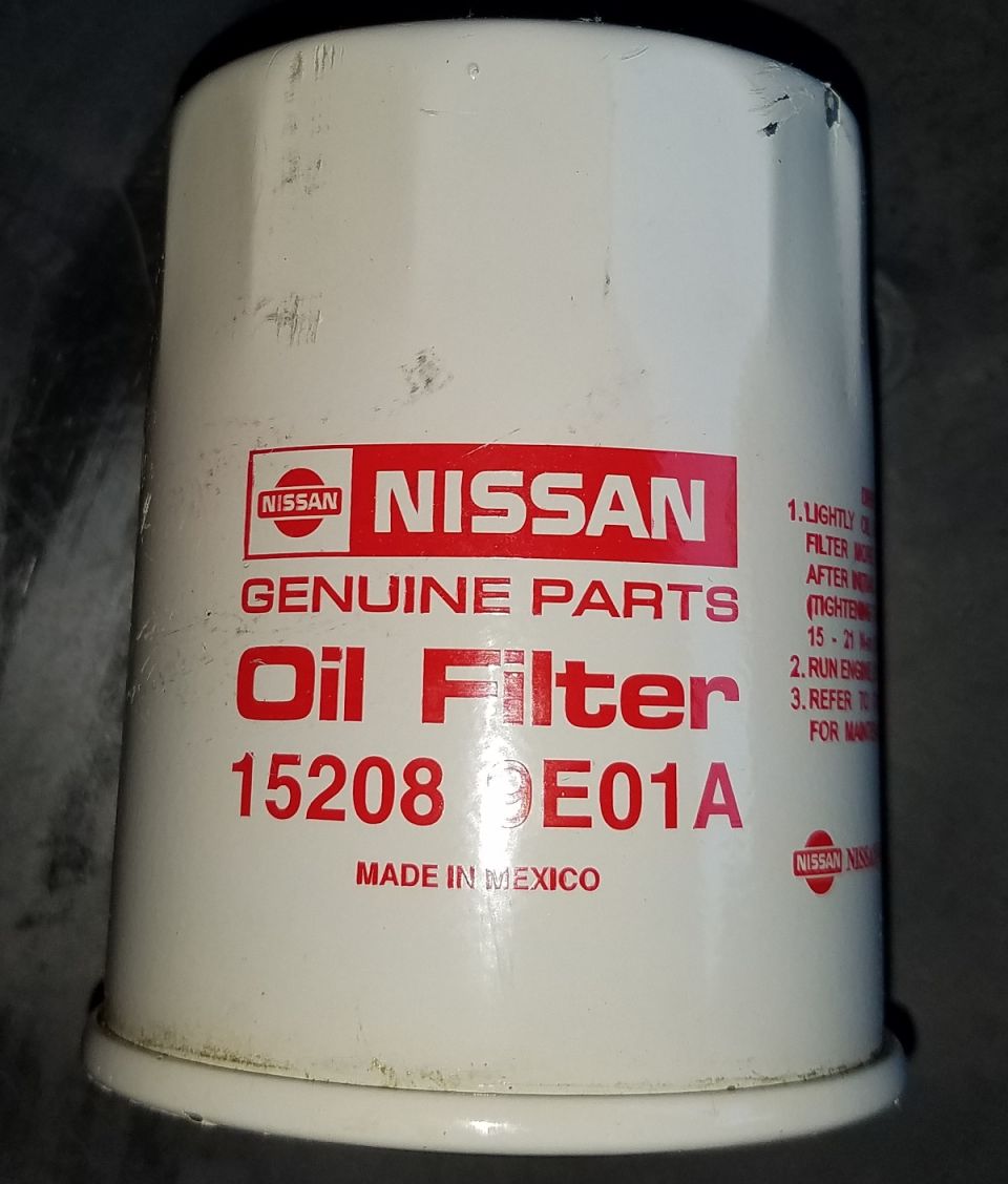 Nissan Genuine Parts oil filter with part number 15208 0E01A