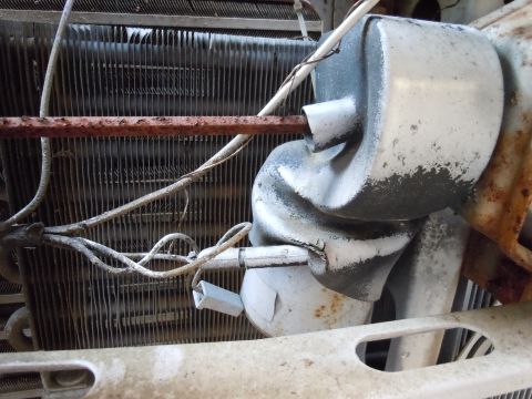 2001 Ford Crown Victoria - This image shows a close-up view of a vehicle's cooling system components, including the radiator and condenser.