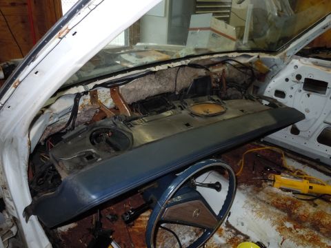 2001 Ford Crown Victoria - The interior of a 2001 Ford Crown Victoria, with the dashboard removed and steering wheel visible.