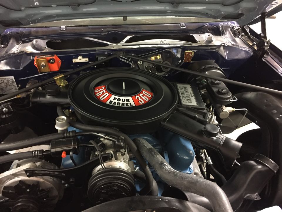 Engine bay with 360 Four Barrel air cleaner and electronic fuel control system