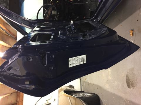 2001 Ford Crown Victoria - The VIN sticker on the door jamb of a dark blue vehicle is clearly visible.