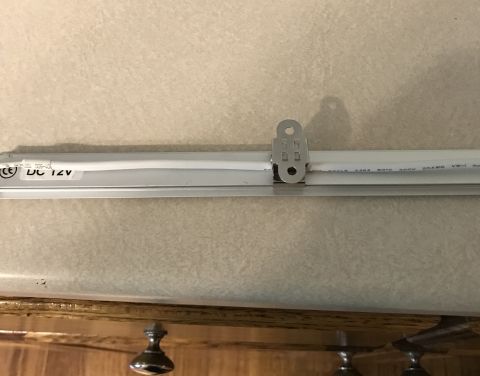1995 Ford Bronco - Close-up of a DC 12V LED light strip attached to a surface.