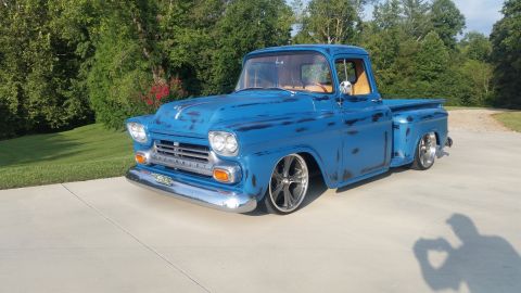 1980 Pontiac Trans Am - Customized 1957 Chevrolet pickup truck with a distressed blue paint job and chrome accents.