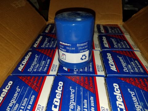 2000 Ford Crown Victoria - A box filled with ACDelco Duraguard oil filters, with one filter prominently displayed on top.